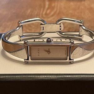Gucci women’s bangle watch